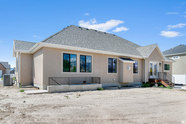 11711 South Halls Crk Road Draper, UT 84020 - Photo 6 of 31 Rear view of property with roof with shingles and stucco siding