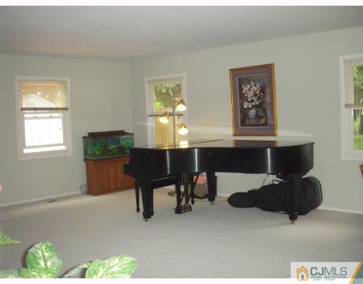 128 Drake Road Somerset, NJ 08873 - Photo 8 of 10 a workspace with furniture and window