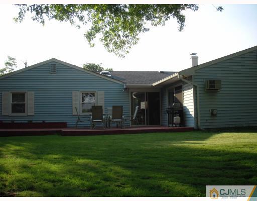 128 Drake Road Somerset, NJ 08873 - Photo 10 of 10 a front view of a house with a garden