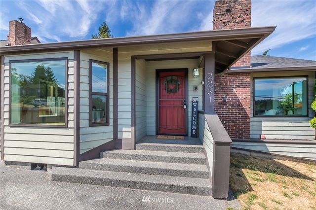 a front view of a house with a porch