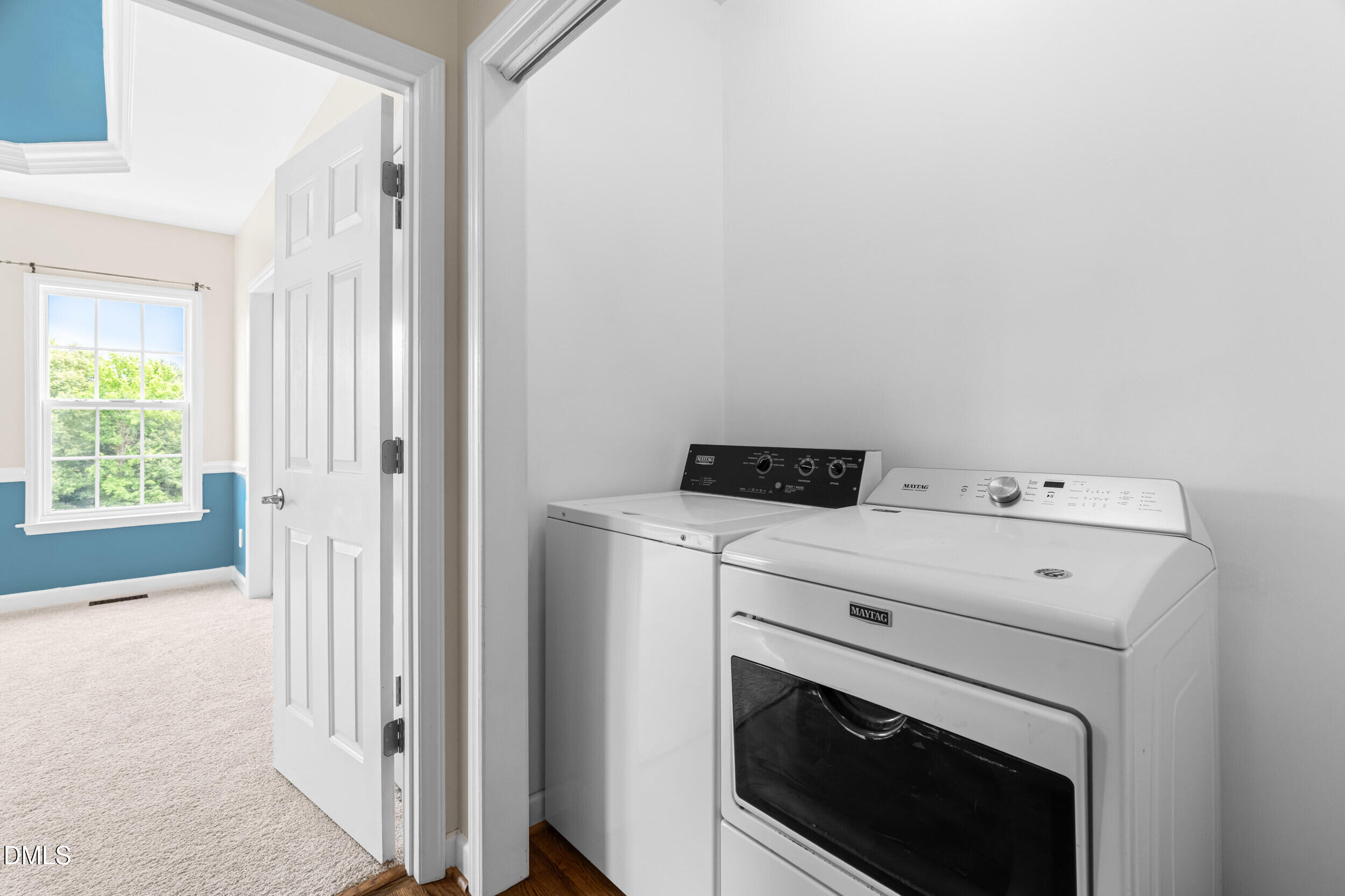 744 Seastone Street Raleigh, NC 27603 - Photo 25 of 53 a utility room with dryer and washer