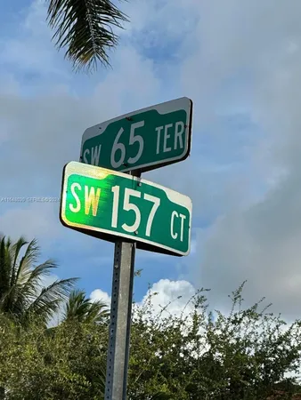 a street sign that is on a wall