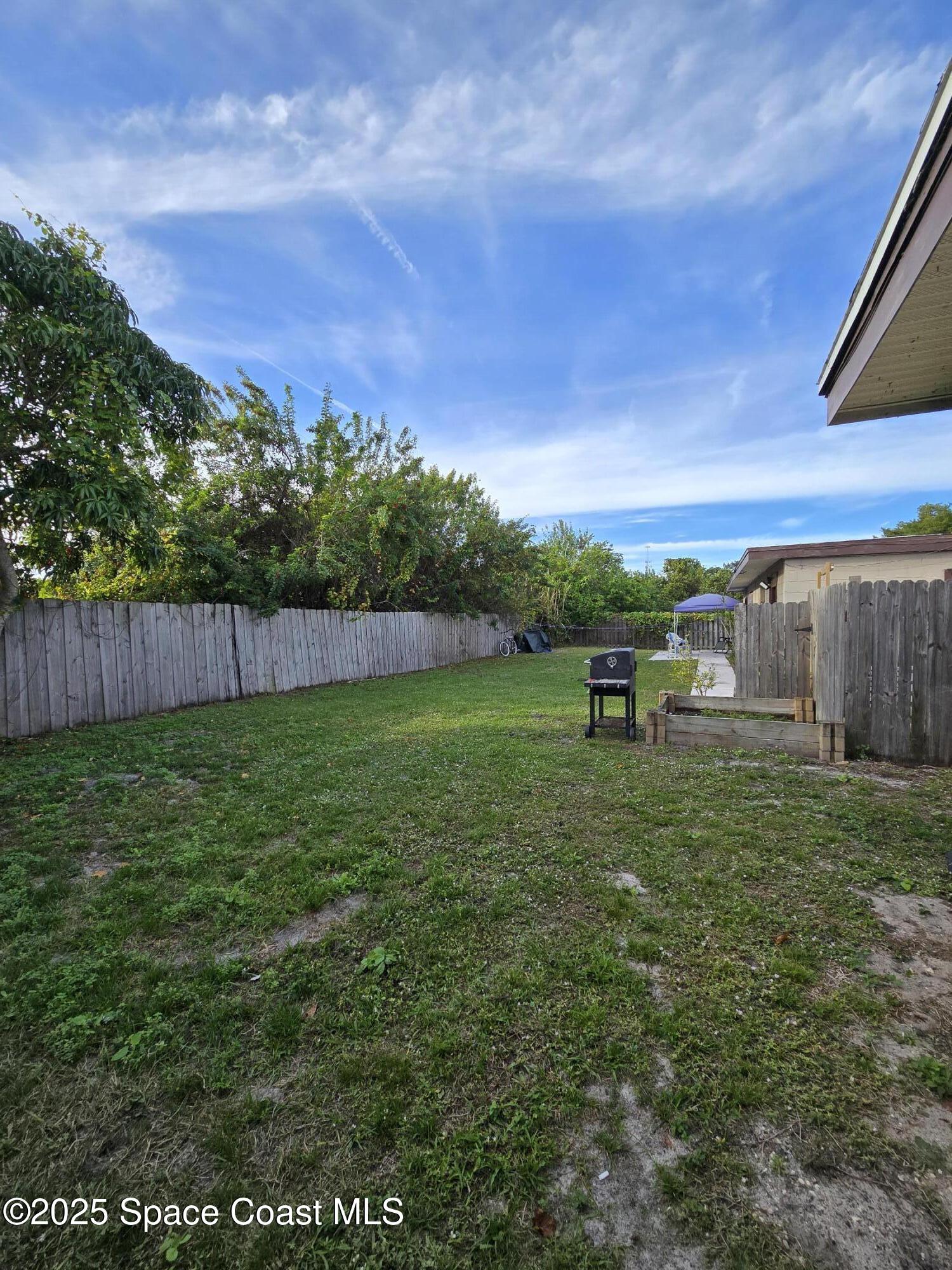 2320 Shenandoah Road, Unit A Palm Bay, FL 32905 - Photo 11 of 11 a view of a backyard
