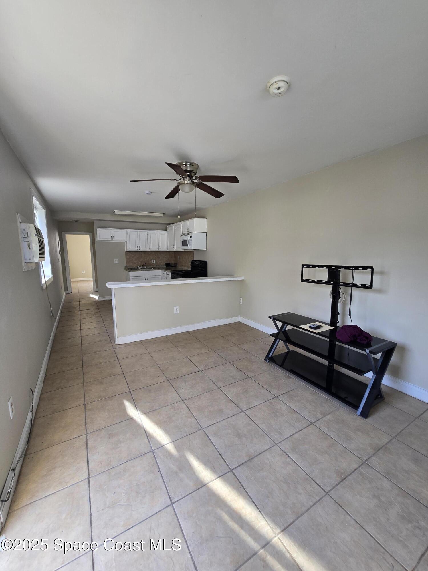 2320 Shenandoah Road, Unit A Palm Bay, FL 32905 - Photo 3 of 11 a living room with furniture