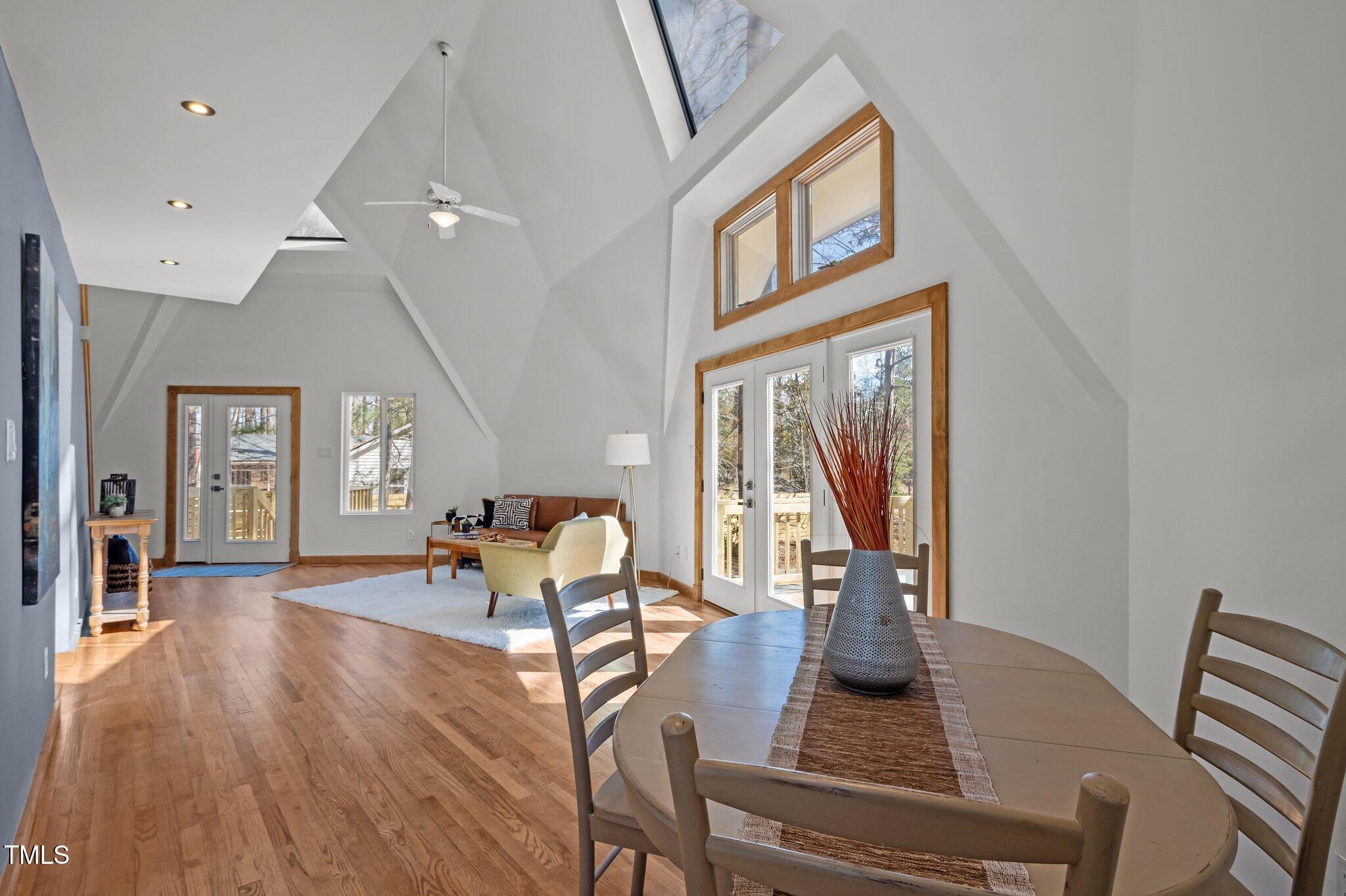 419 Obie Drive Durham, NC 27713 - Photo 11 of 33 a view of a livingroom with furniture window and wooden floor