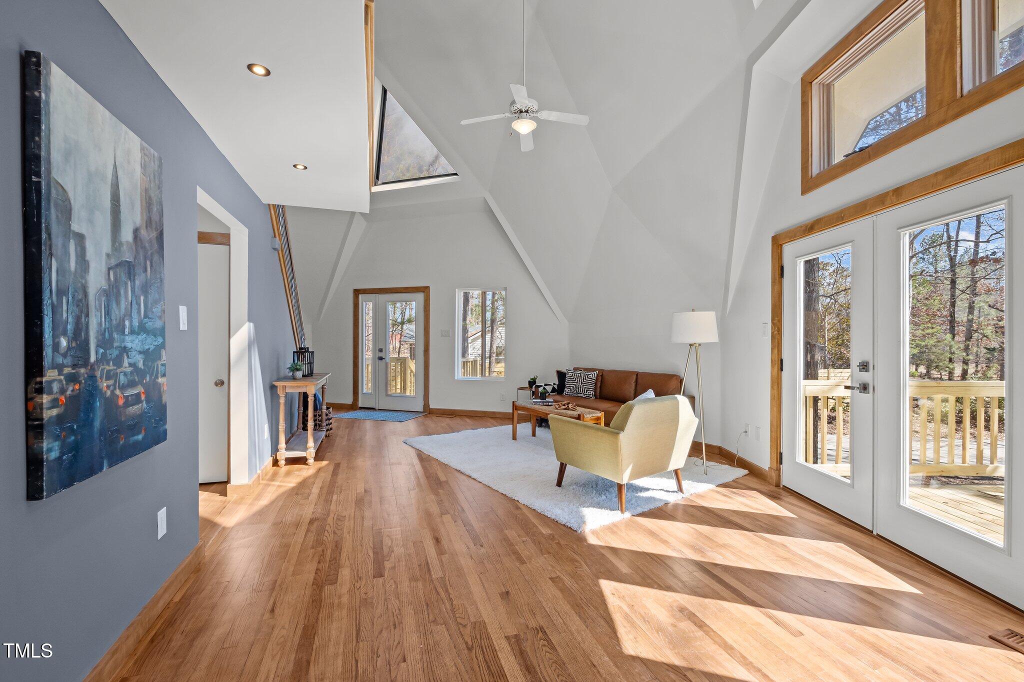 419 Obie Drive Durham, NC 27713 - Photo 12 of 33 a living room with furniture and a wooden floor