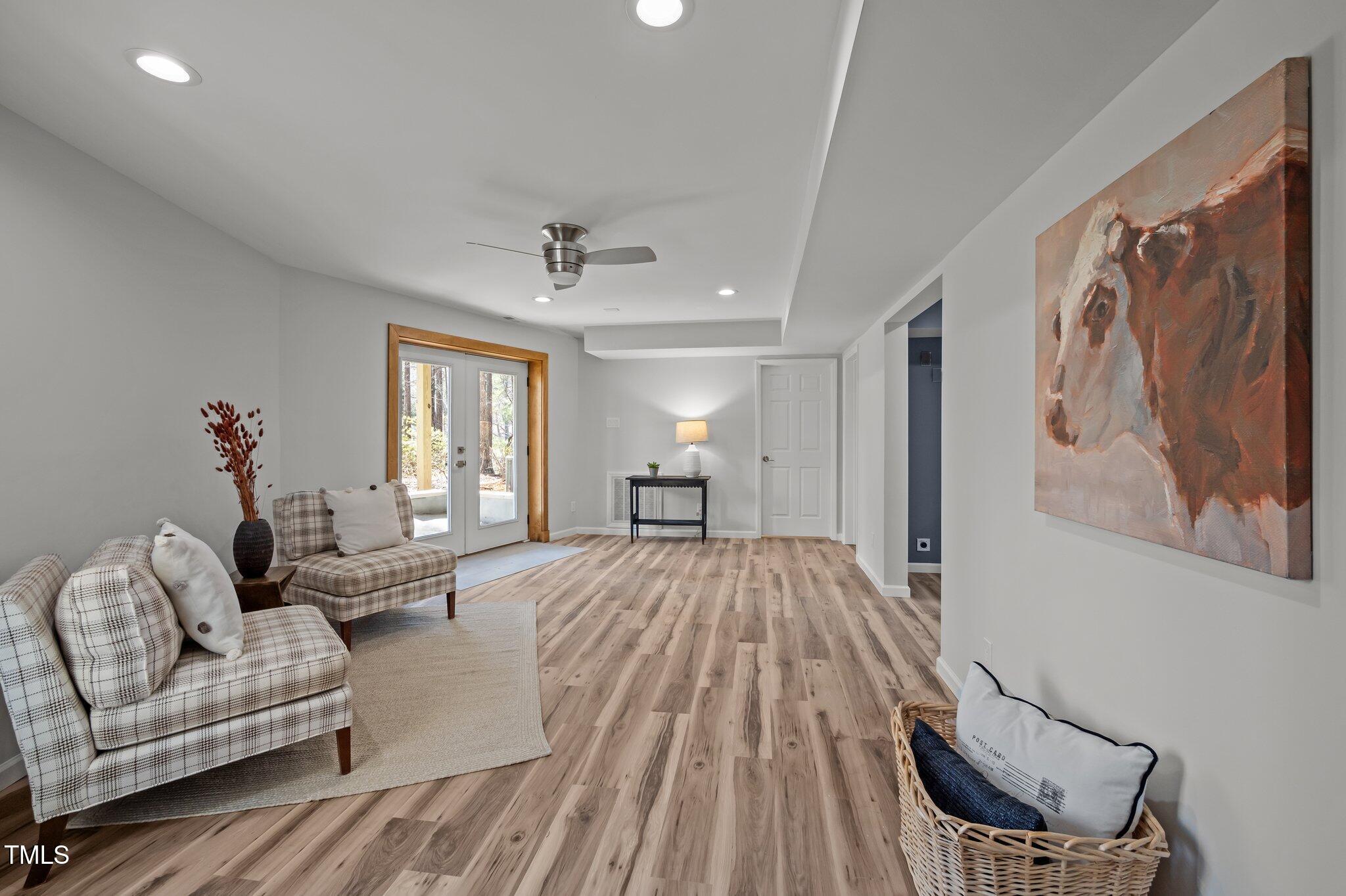 419 Obie Drive Durham, NC 27713 - Photo 17 of 33 a living room with furniture and a wooden floor