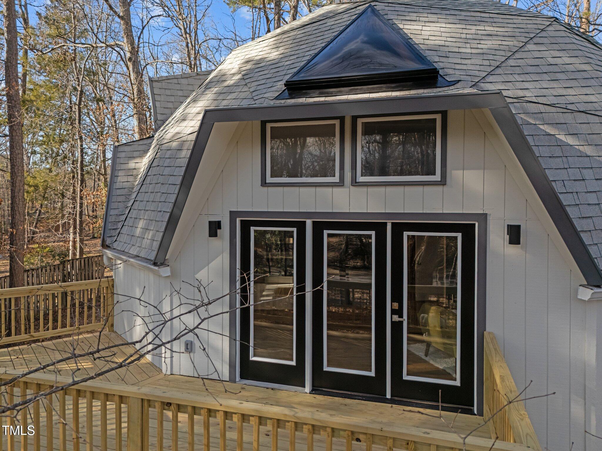419 Obie Drive Durham, NC 27713 - Photo 20 of 33 a front view of a house with glass windows
