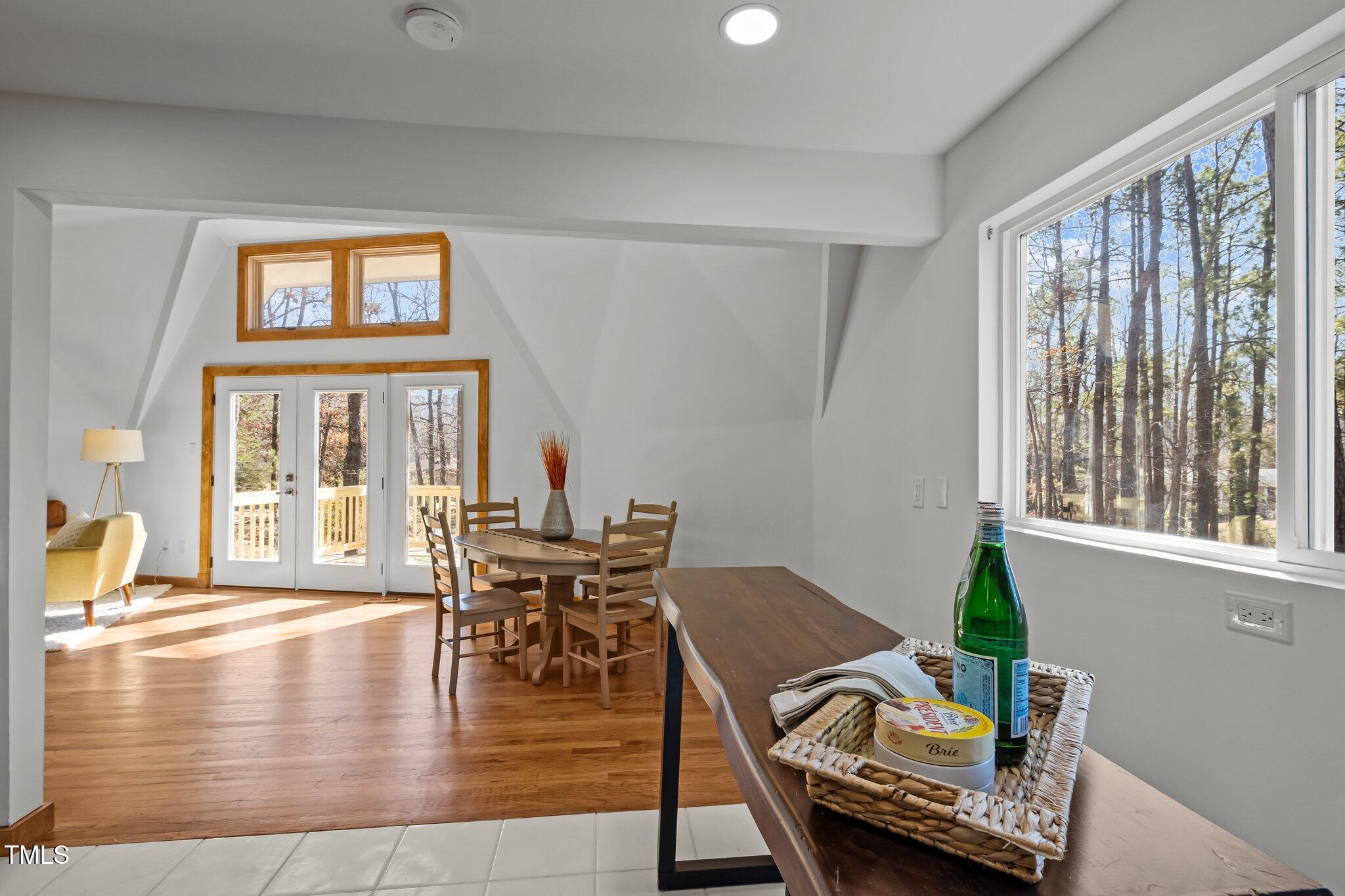 419 Obie Drive Durham, NC 27713 - Photo 10 of 33 a view of a livingroom with furniture window and wooden floor