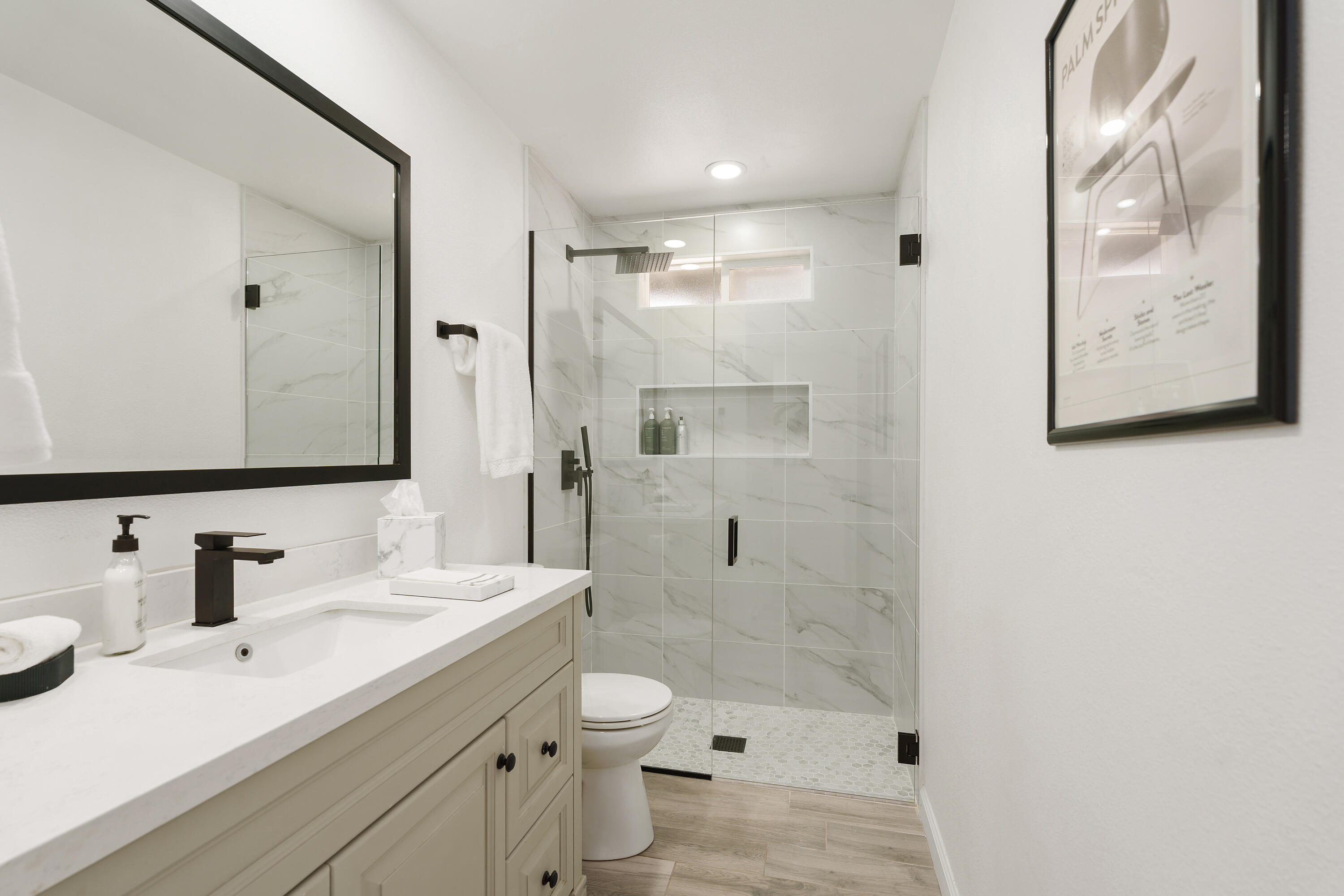 37081 Palmdale Road Rancho Mirage, CA 92270 - Photo 32 of 46 a bathroom with a sink a toilet and shower