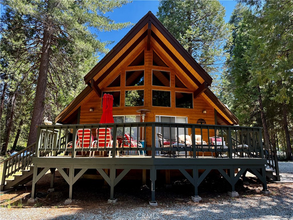 a sign on the wall of the house