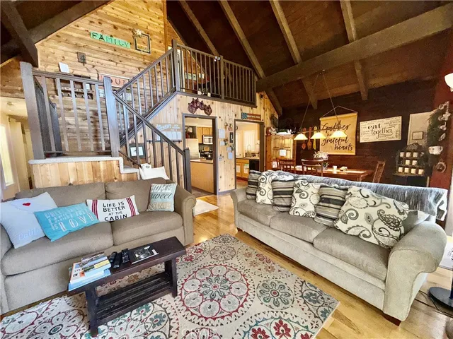 a view of a living room with furniture