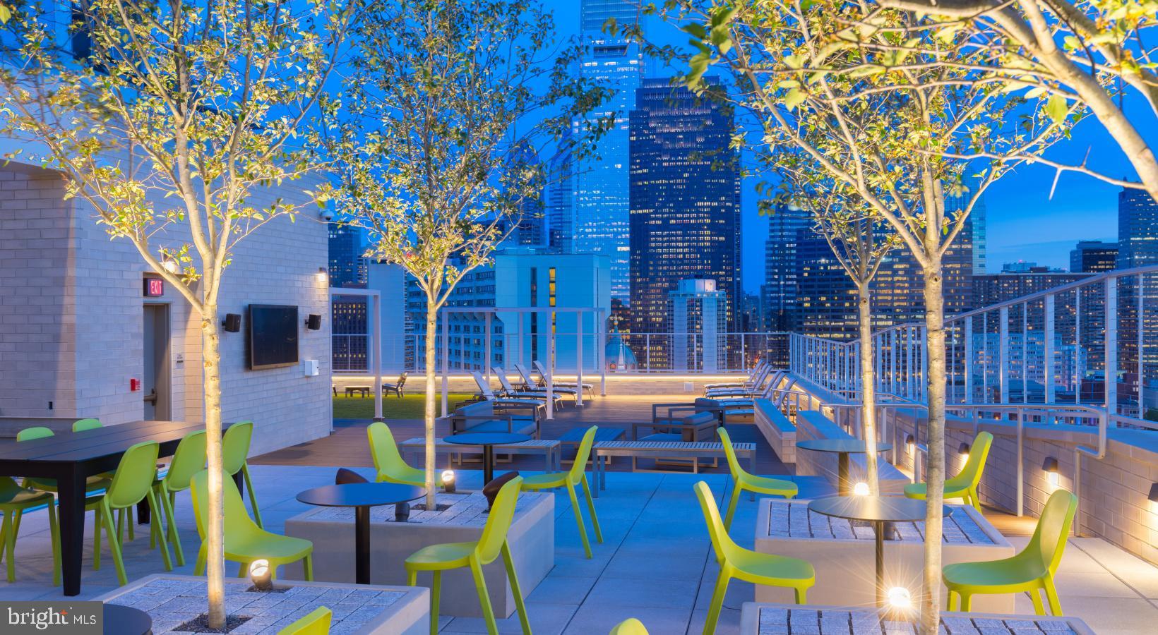 450 North 18th Street, Unit 1B1345 Philadelphia, PA 19130 - Photo 5 of 44 a view of an chairs and tables in the patio