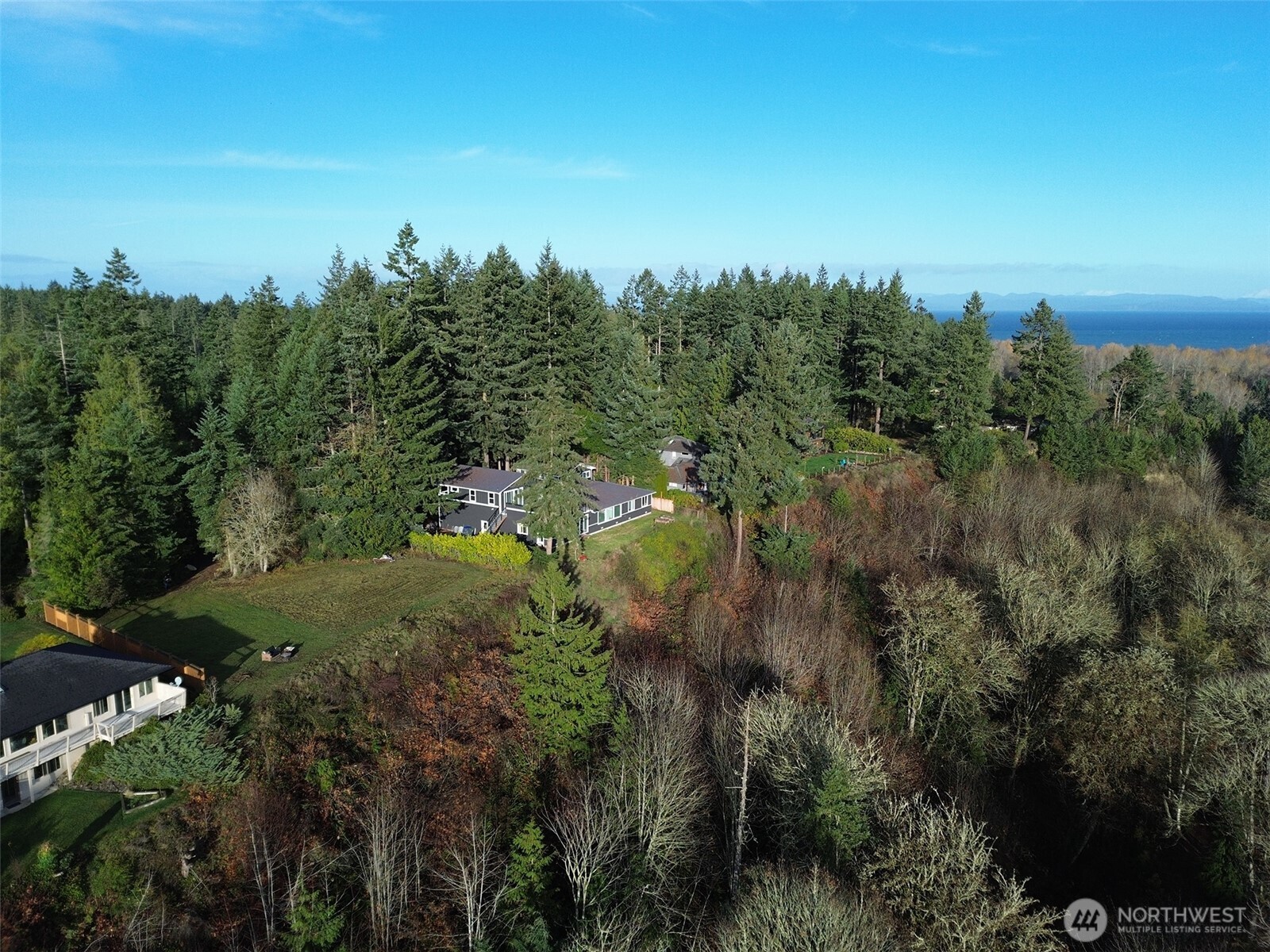 714 Hunt Road Port Angeles, WA 98363 - Photo 40 of 40 a view of a city with lush green forest