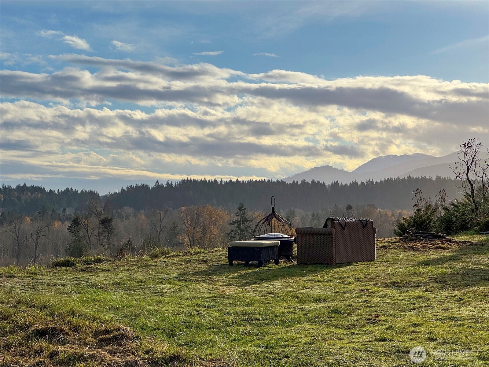 714 Hunt Road Port Angeles, WA 98363 - Photo 10 of 40 a view of a lake with a mountain