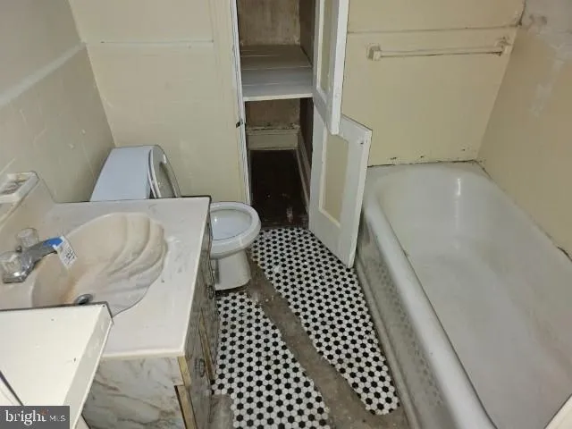 a bathroom with a sink and a shower