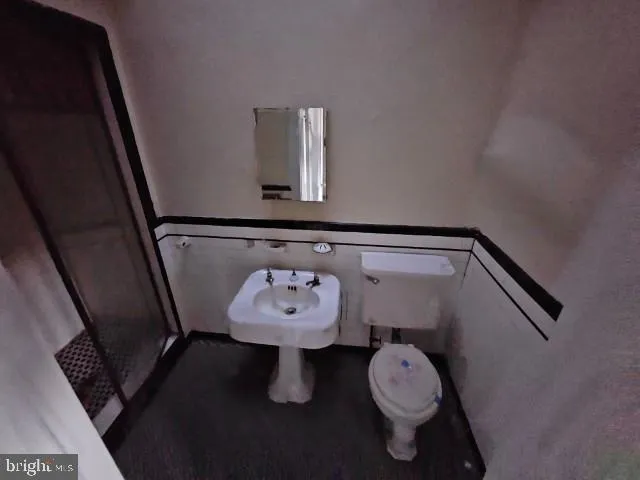 a view of bathroom with toilet