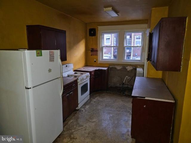 6253 Morton Street Philadelphia, PA 19144 - Photo 5 of 17 a kitchen with stainless steel appliances granite countertop a refrigerator a sink a stove and a refrigerator