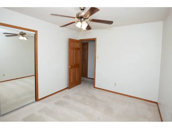 a bathroom with a shower and a toilet