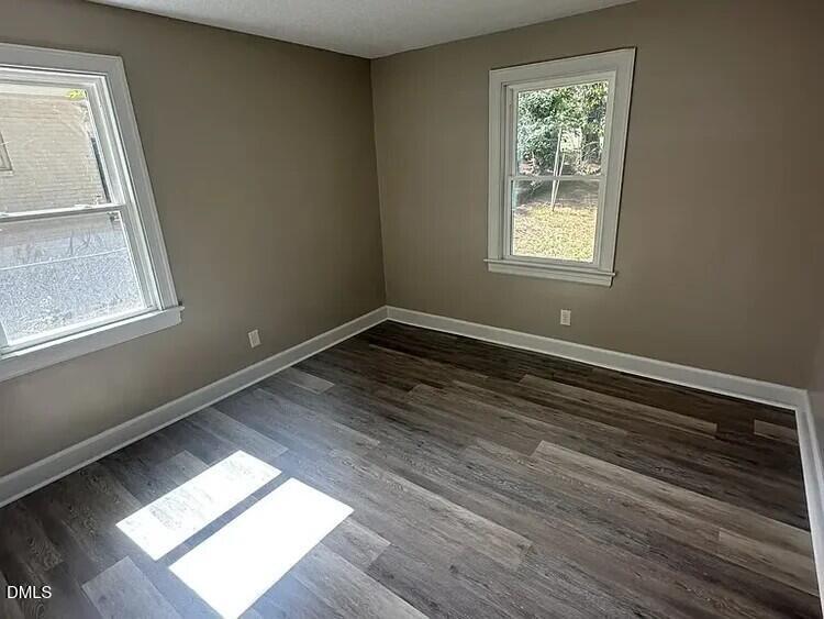 902 Meadow Street South Wilson, NC 27893 - Photo 8 of 10 a view of an empty room and window