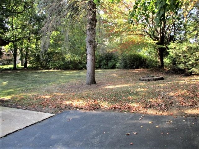 555 Baintree Road Lake Summerset, IL 61019 - Photo 5 of 24 a view of a yard with trees