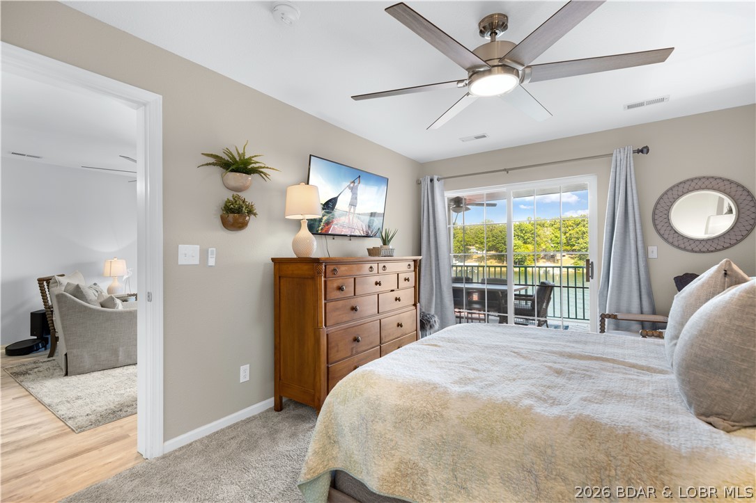 182 Sac Road, Unit C 201 Sunrise Beach, MO 65079 - Photo 17 of 35 Primary Suite has Deck Access