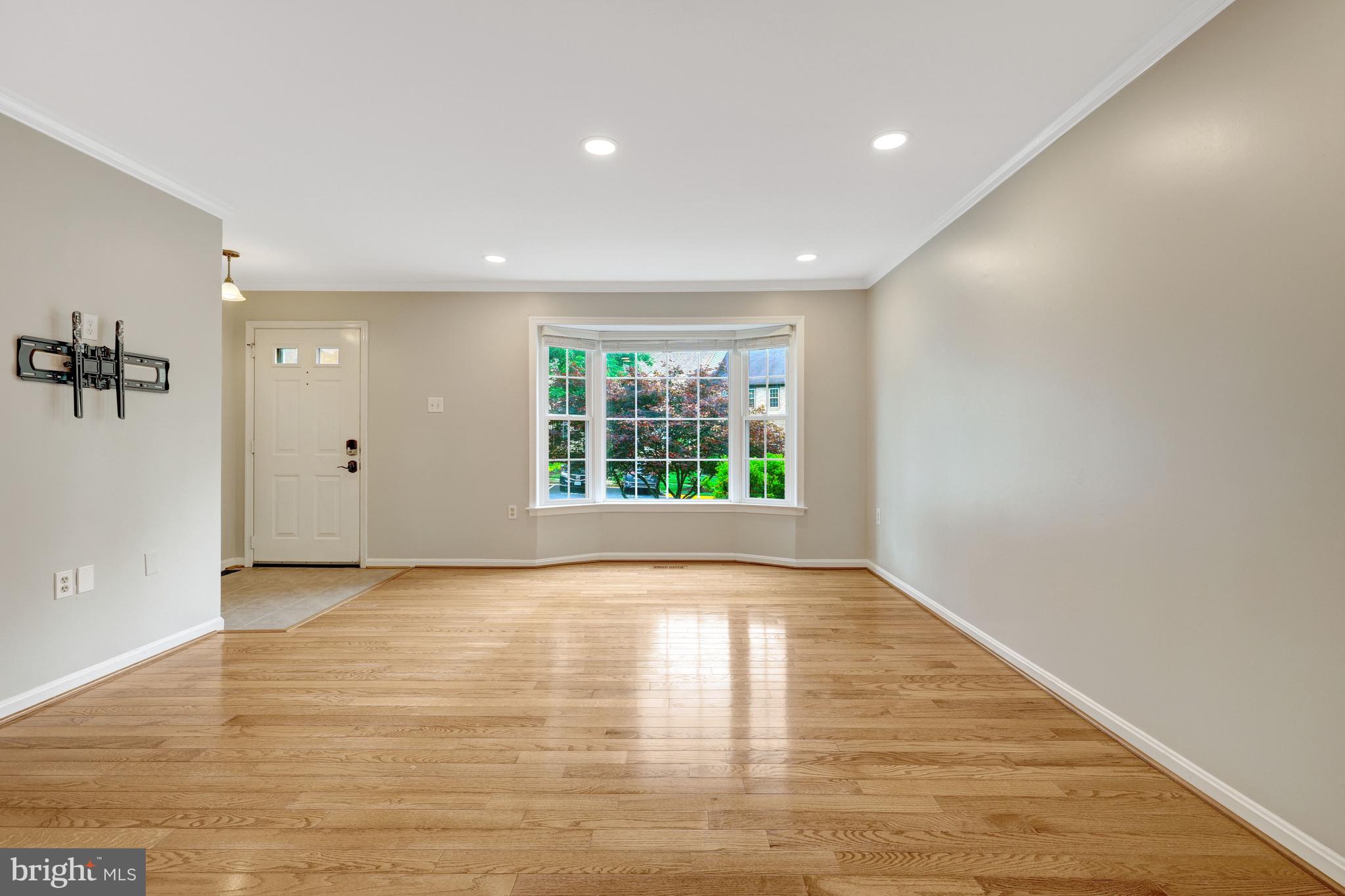 11992 Sentinel Point Court Reston, VA 20191 - Photo 8 of 49 Large bay window and hardwood floors