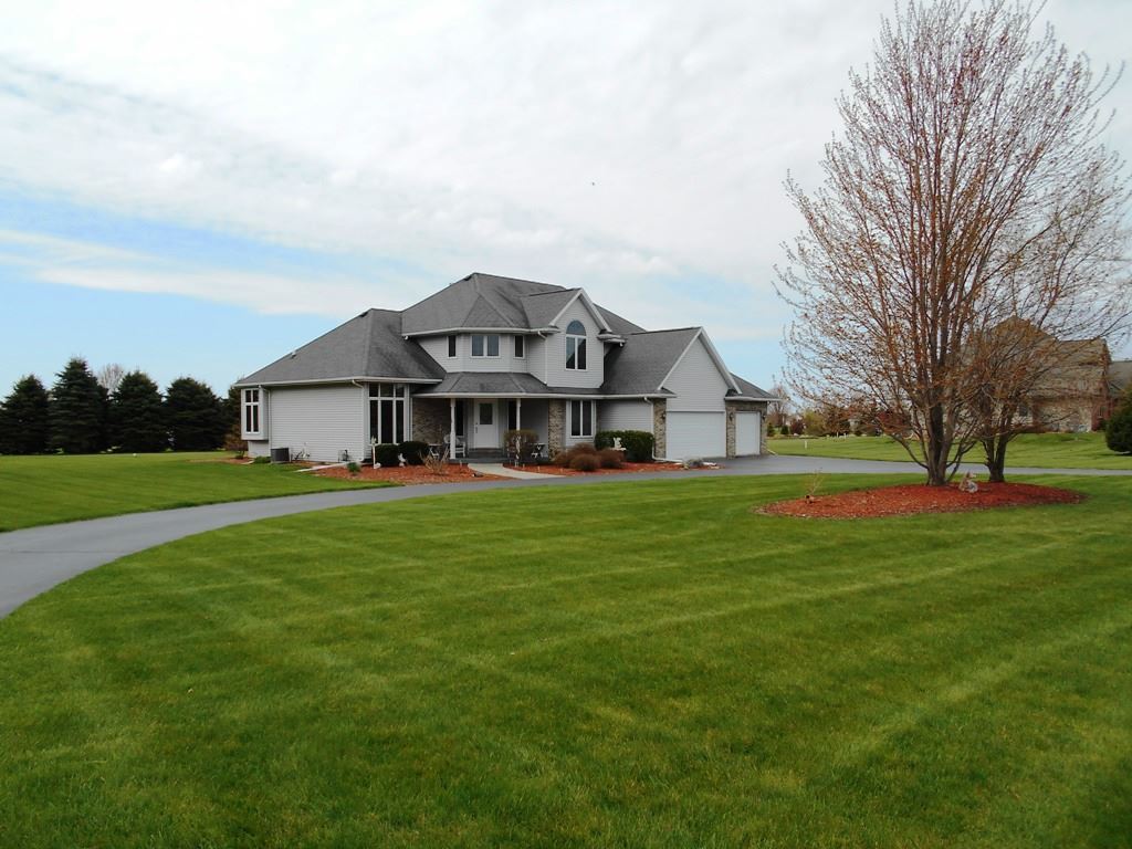 6733 Middle Road South Beloit, IL 61080 - Photo 18 of 19 a front view of house with yard and green space