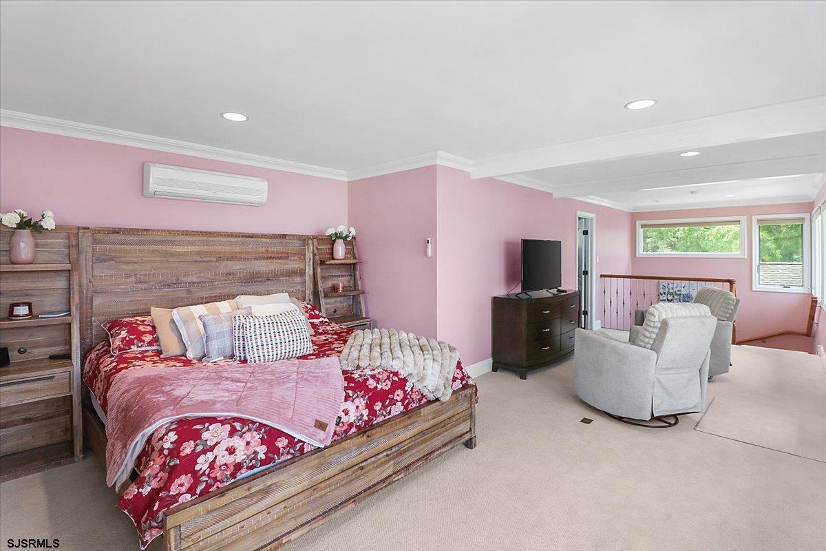 401 Clarkstown Road Mays Landing, NJ 08330 - Photo 26 of 57 a bedroom with a large bed and a couch