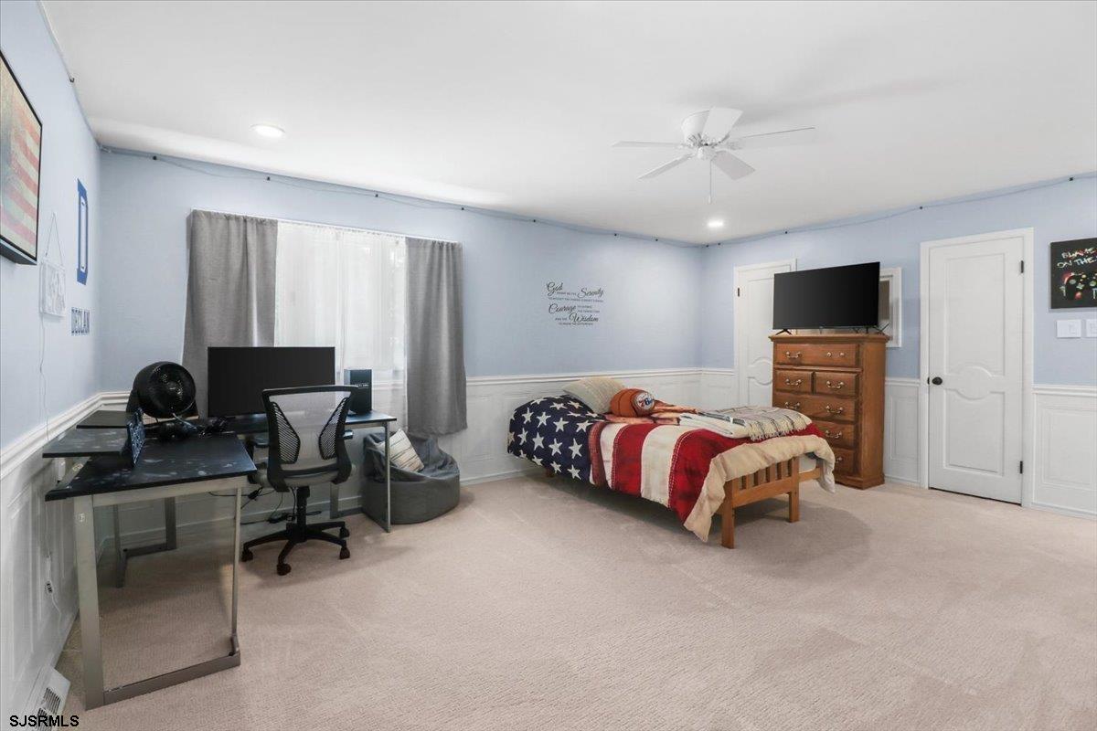 401 Clarkstown Road Mays Landing, NJ 08330 - Photo 35 of 57 a bedroom with a bed and a computer on the desk