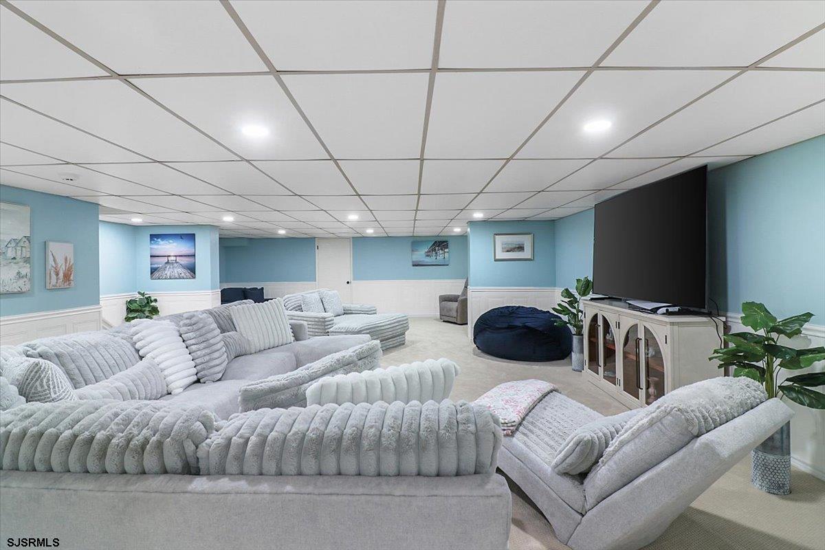 401 Clarkstown Road Mays Landing, NJ 08330 - Photo 45 of 57 a living room with furniture and a flat screen tv