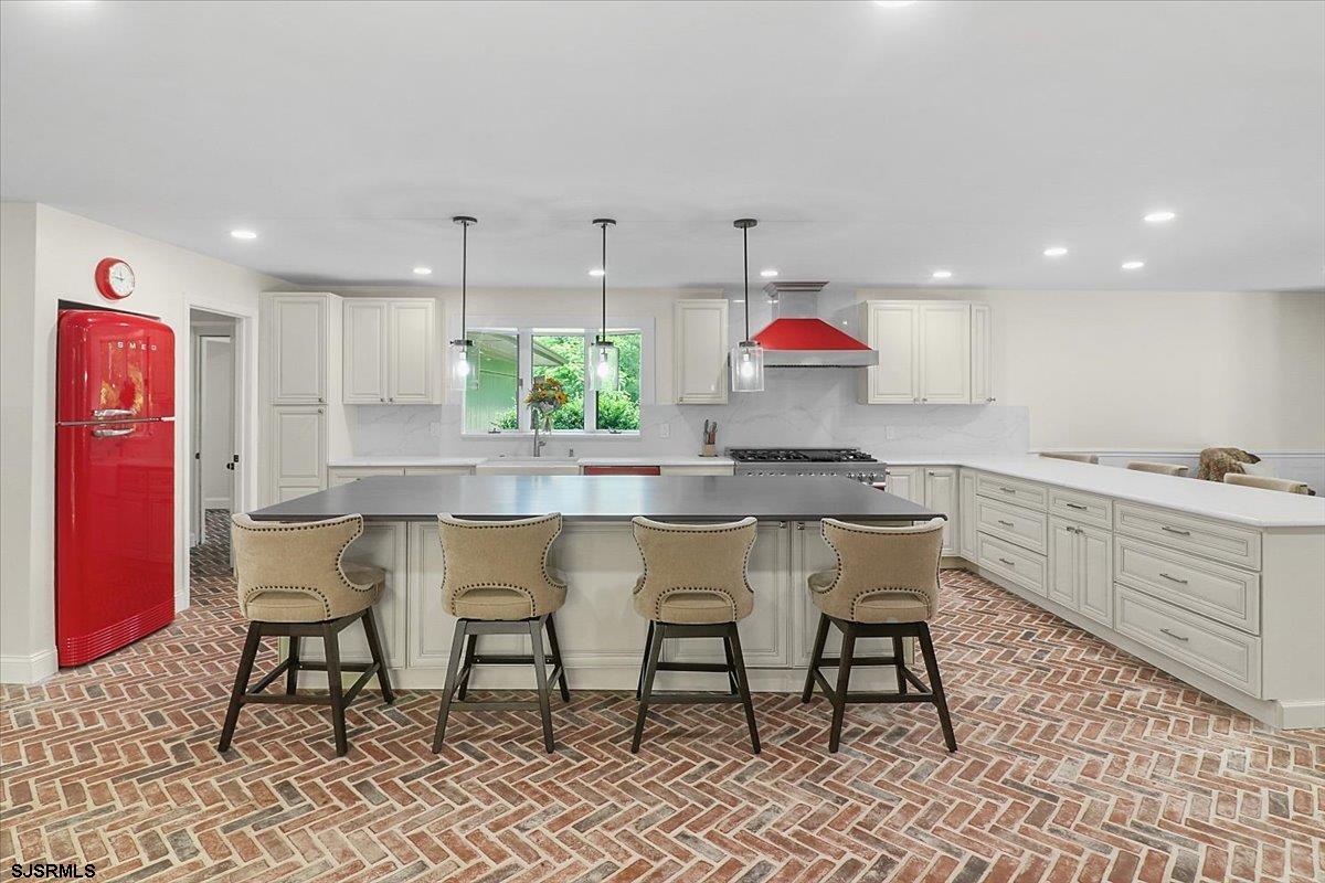 401 Clarkstown Road Mays Landing, NJ 08330 - Photo 7 of 57 a kitchen with stainless steel appliances granite countertop a chairs a sink and a refrigerator