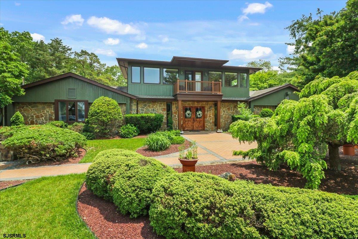 401 Clarkstown Road Mays Landing, NJ 08330 - Photo 9 of 57 a front view of a house with a yard and potted plants