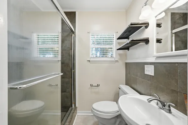a bathroom with a sink and a toilet