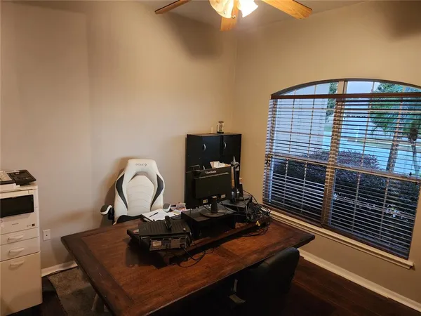 a view of a workspace with furniture