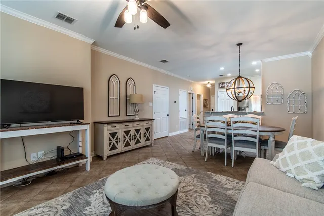 a view of a dining room and a livingroom