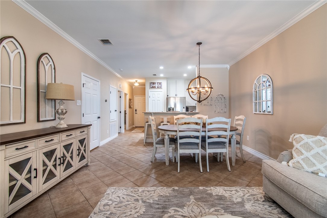 1117 Ninth Street, Unit 803 Port Aransas, TX 78373 - Photo 15 of 27 a view of a dining room and a livingroom
