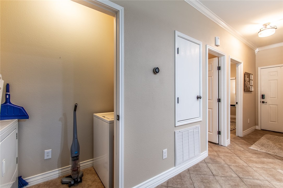 1117 Ninth Street, Unit 803 Port Aransas, TX 78373 - Photo 26 of 27 a view of a bathroom with a tub and shower