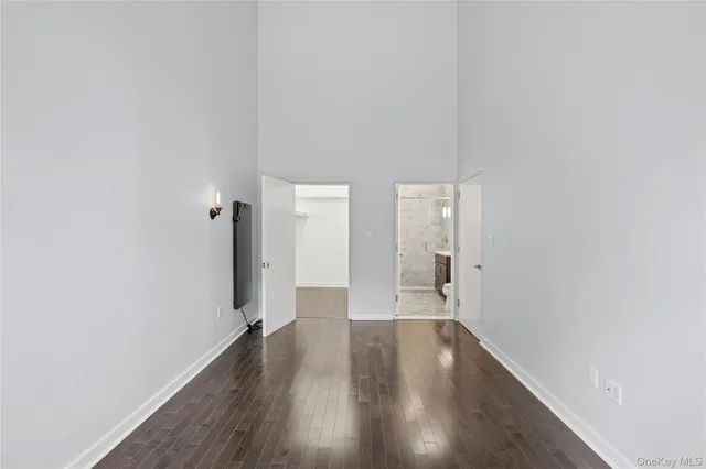 a view of wooden floor in an empty room