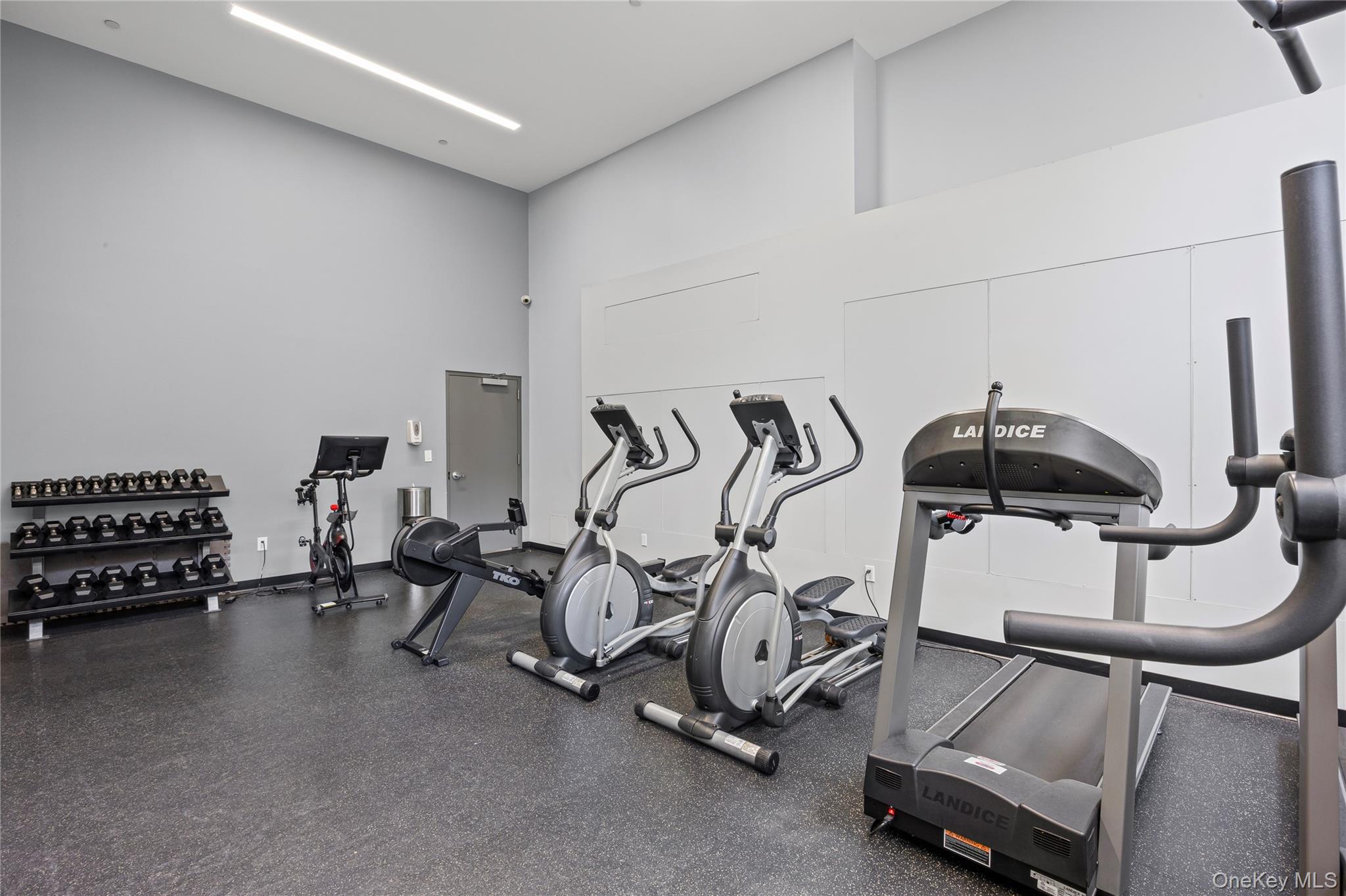 240 51st Avenue, Unit 1H Queens, NY 11101 - Photo 33 of 39 a view of a room with gym equipment