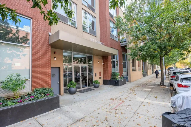 a view of a building with sitting area