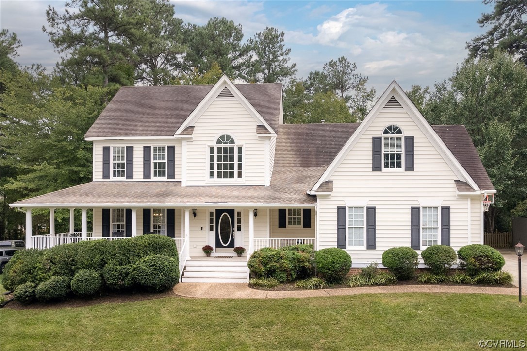 15725 Fox Marsh Drive Moseley, VA 23120 - Photo 1 of 50 a front view of a house with a yard