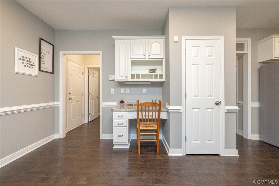 15725 Fox Marsh Drive Moseley, VA 23120 - Photo 21 of 50 an empty room with cabinet and windows