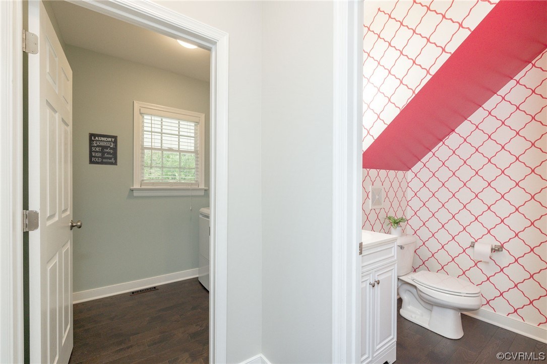 15725 Fox Marsh Drive Moseley, VA 23120 - Photo 22 of 50 a bathroom with a toilet and a shower curtain