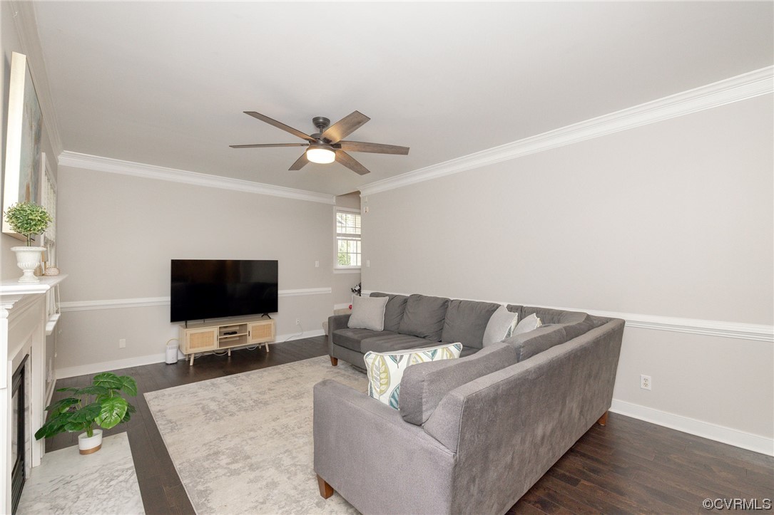 15725 Fox Marsh Drive Moseley, VA 23120 - Photo 24 of 50 a living room with furniture and a flat screen tv