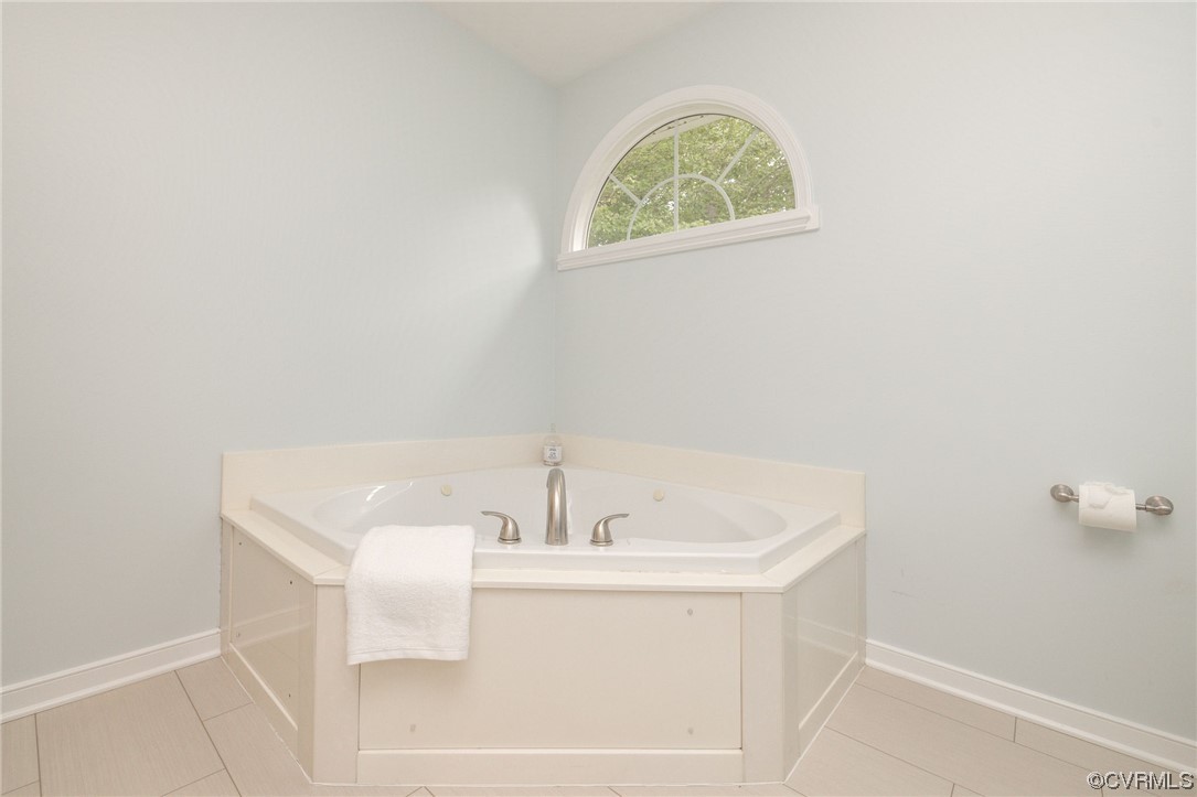 15725 Fox Marsh Drive Moseley, VA 23120 - Photo 36 of 50 a white bath tub sitting next to a white sink