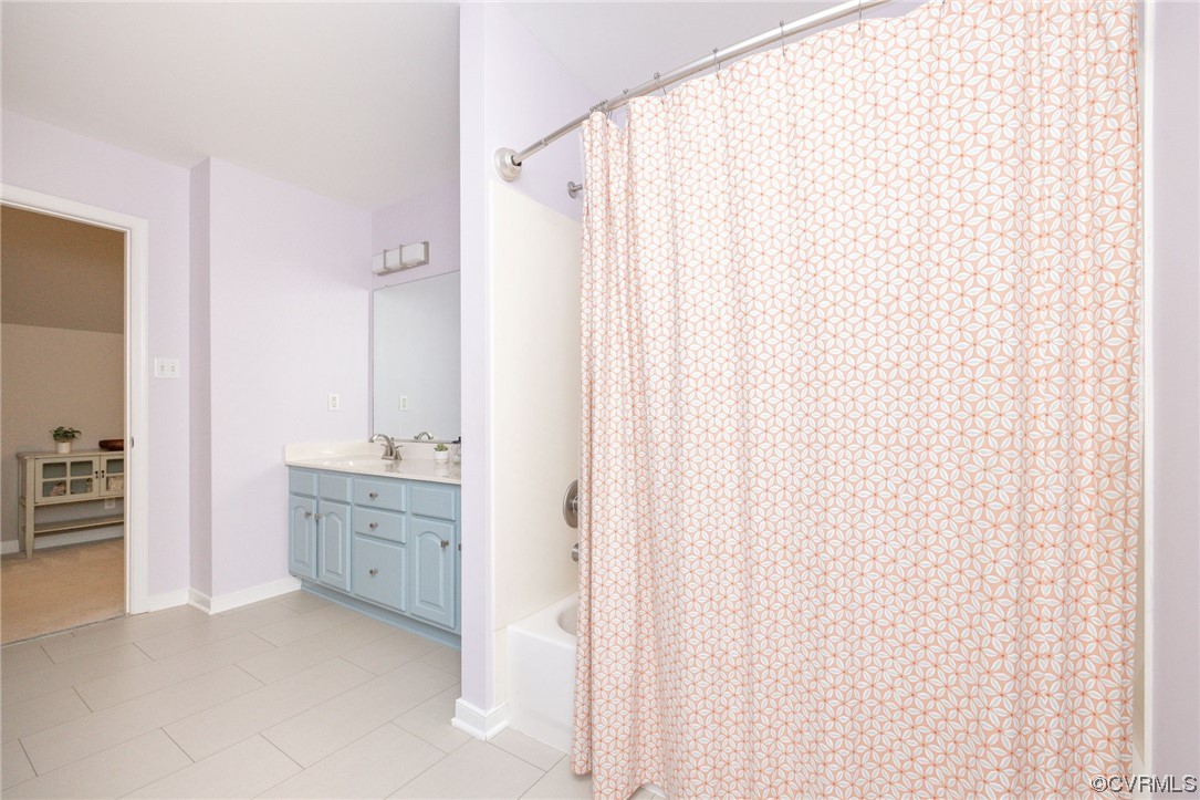 15725 Fox Marsh Drive Moseley, VA 23120 - Photo 40 of 50 a bathroom with a sink and a mirror