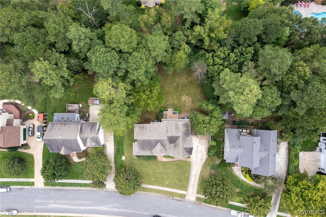 15725 Fox Marsh Drive Moseley, VA 23120 - Photo 50 of 50 an aerial view of residential houses with outdoor space and trees