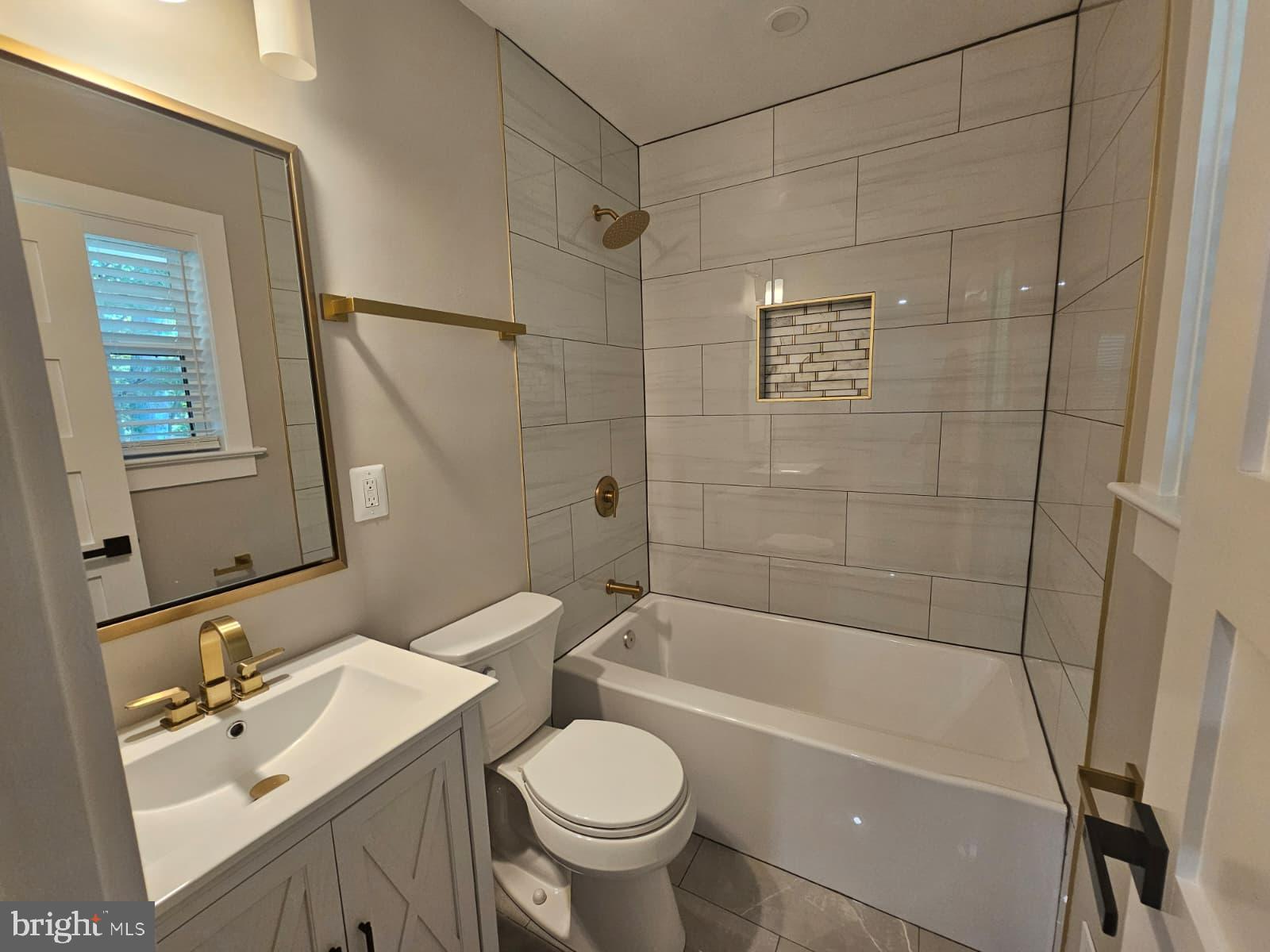 2909 Chapelview Drive Silver Spring, MD 20904 - Photo 12 of 39 a bathroom with a sink toilet and shower