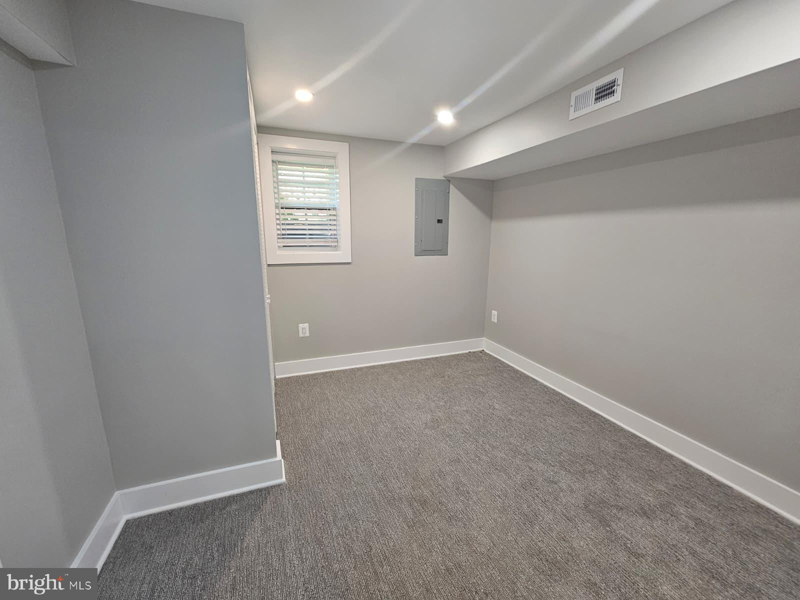2909 Chapelview Drive Silver Spring, MD 20904 - Photo 22 of 39 a view of an empty room with a window